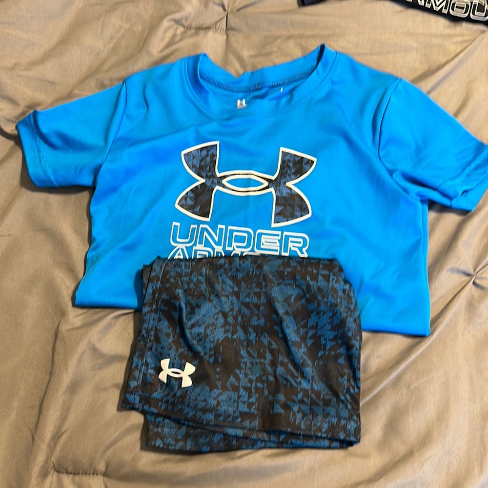 Under Armour size 7 boy short sleeve shirt and short set.